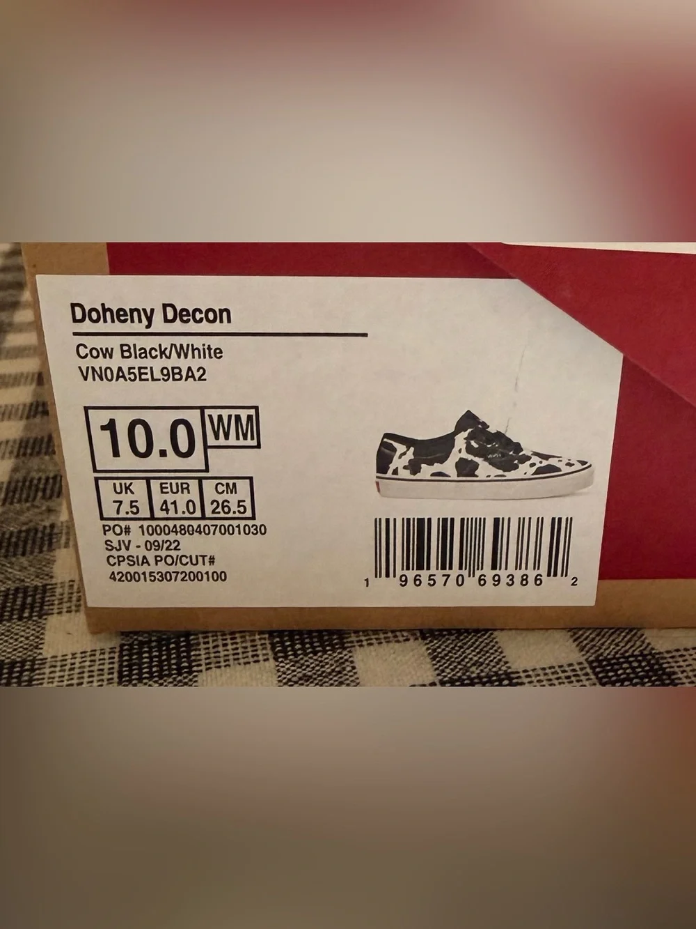 Vans Women’s Cow Print Slip-Ons